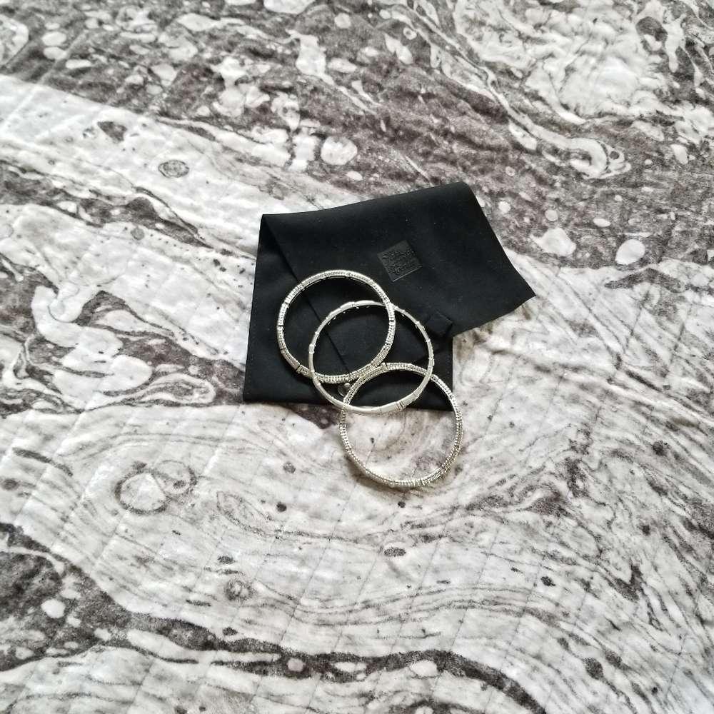 Three sterling silver bangles